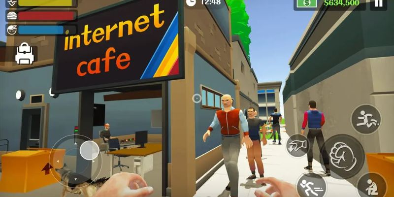Hình ảnh của một khu vực cà phê internet đông đúc với nhiều máy tính